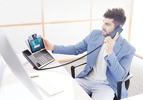 Telepon IP Yealink seri T5 di meja kerja